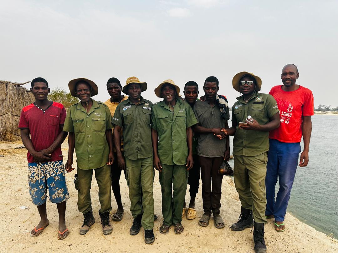 Fish Monitors and Fishermen pausing for a picture along Zambezi river in Kabulangonze fish camp after an awareness session of the GBV linkgages with the fisheries sector. 