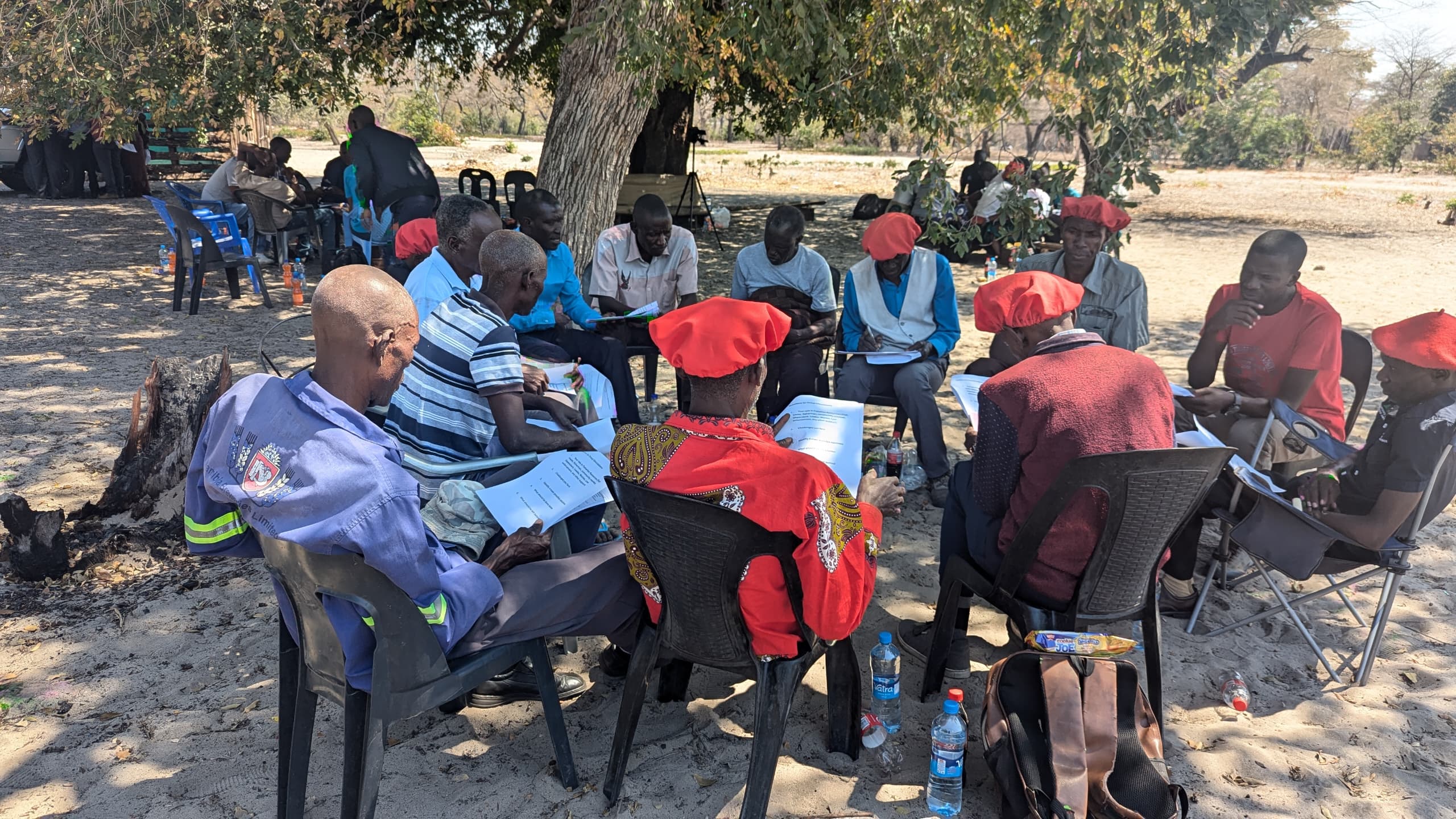 Traditional leaders from the Barotse Royal Establishment in Western Province of Zambia, brainstorming on the best solution during a comflict management session. 