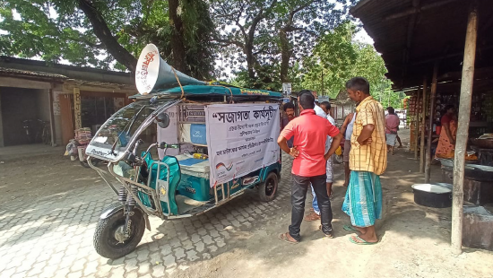 Mobile vans used for public announcement about the programme. Credit: Kalong Kapili