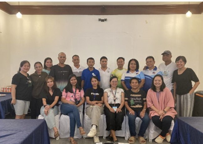 Participants of a workshop introducing the financial model in Siargao
