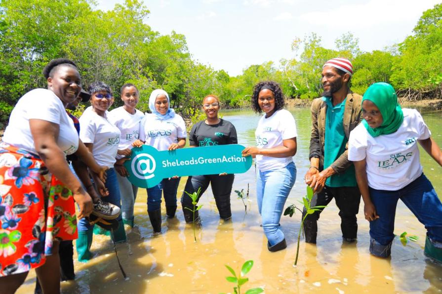 2nd cohort of She Leaders of the She Leads Green Action program during mangrove restoration activity at Kunduchi.