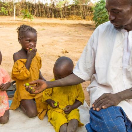 Malik feeds his family Trees for the Future