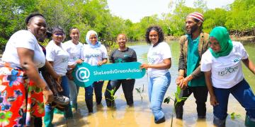 2nd cohort of She Leaders of the She Leads Green Action program during mangrove restoration activity at Kunduchi.