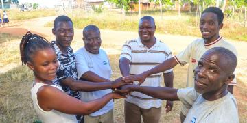 The newly restructured leadership of the Mtakimau Community Forest Association (CFA) stands together in unity following a successful planning meeting.