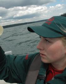Park ranger conducting monitoring activities © Parks Canada